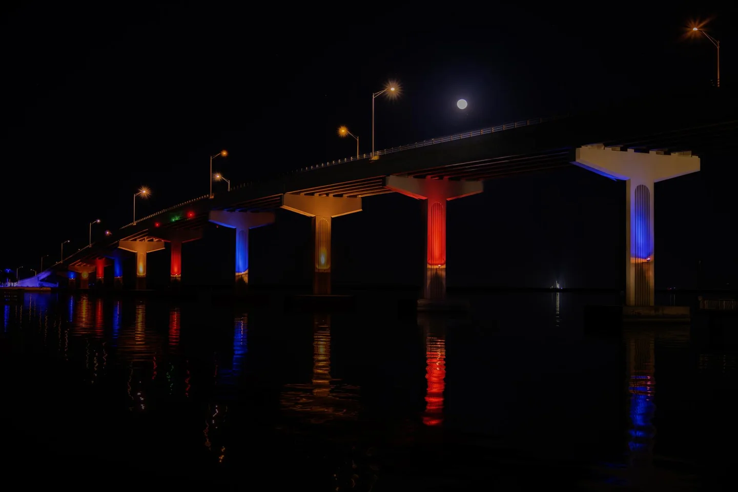 Moonrise over the Max Brewer Bridge in Titusville